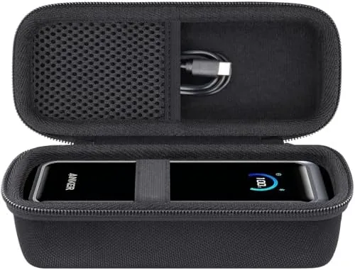 The Anker Prime power bank seated inside the molded foam interior of the open case