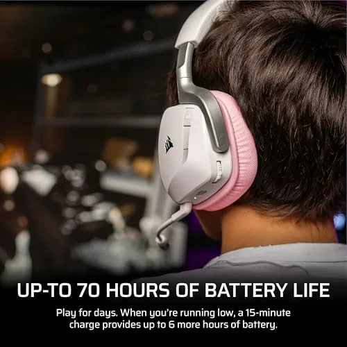 The headset in use on a couch with a Switch showing handheld gaming