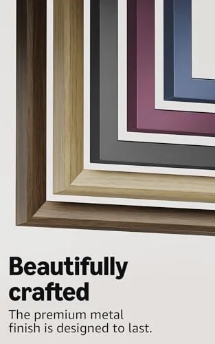 Guest looking at the framed TV thinking it is a painting