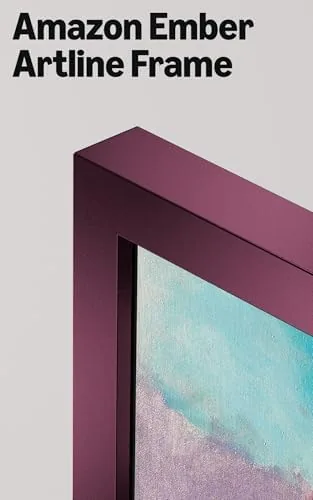 Living room with the framed art TV above a walnut console