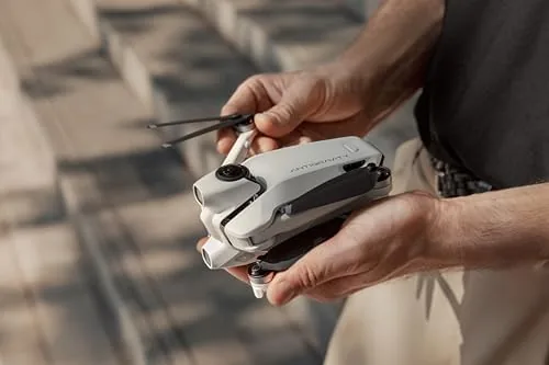 The A1 drone hovering above a field with a 360 camera view captured in the app