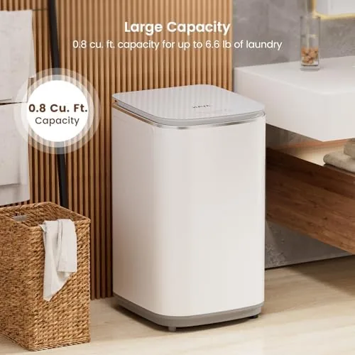 The portable washer beside a full-sized washer and a laundry basket for comparison