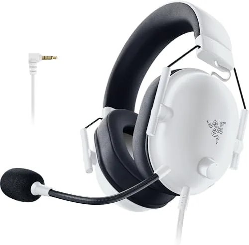 The white Razer BlackShark V2 X headset on a desk with the boom microphone attached