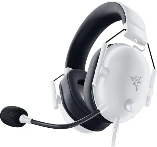 The detached microphone lying next to the headset on the desk