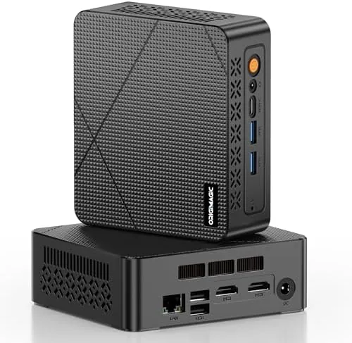 C3 mini PC standing next to a monitor on a desk