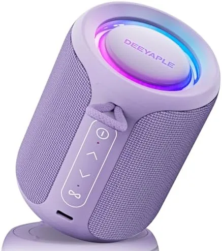 Purple IP67 Bluetooth speaker beside a pool