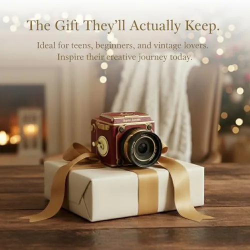 The vintage camera side by side with a conventional budget point and shoot