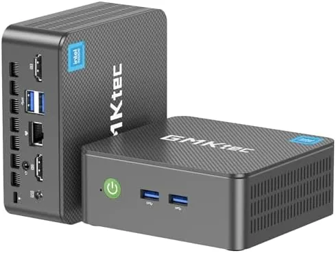 GMKtec G3S Mini PC sitting small on a desk beside a monitor