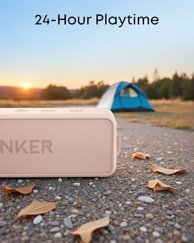 The Soundcore 2 speaker by a pool with water nearby