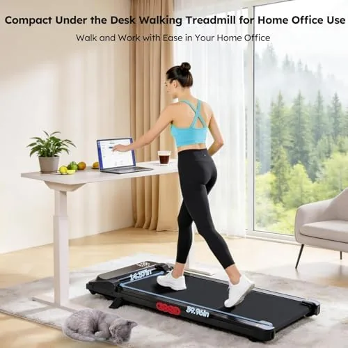 Compact walking pad next to a large full sized treadmill