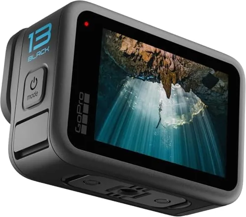The GoPro camera in its protective case with batteries and accessories organized
