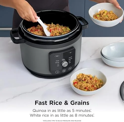 The HyperHeat cooker beside a standard pressure cooker for comparison