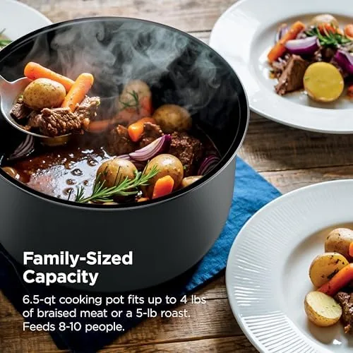 A family dinner table with the SimpliServe pot full of braised beef