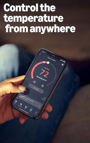 The two thermostats installed in different rooms with the Alexa app open on a phone