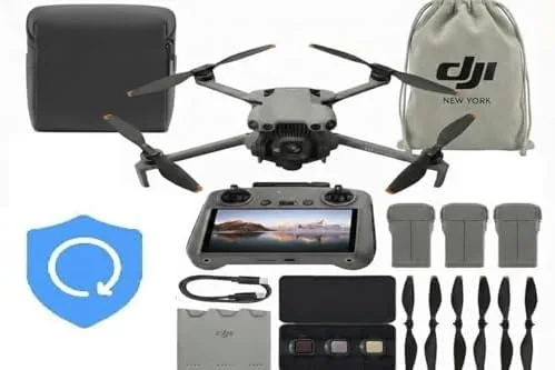 The DJI Mini 5 Pro unfolded with the DJI RC 2 controller in the foreground