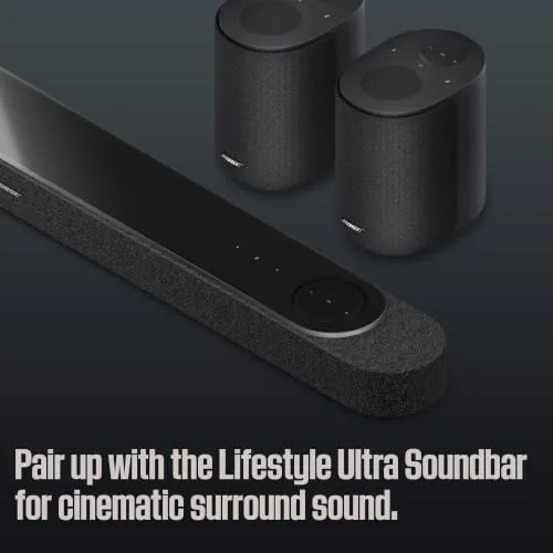 Two Bose Lifestyle Ultra speakers grouped for stereo playback in a living room