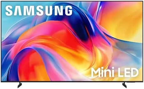 Samsung M70H 55-inch Mini LED television on a media stand in a home office