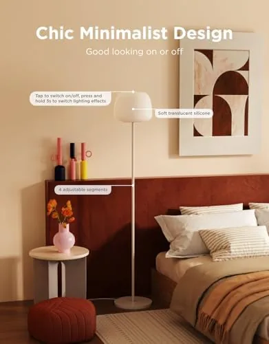 The lamp showing a warm amber to purple gradient across its diffuser