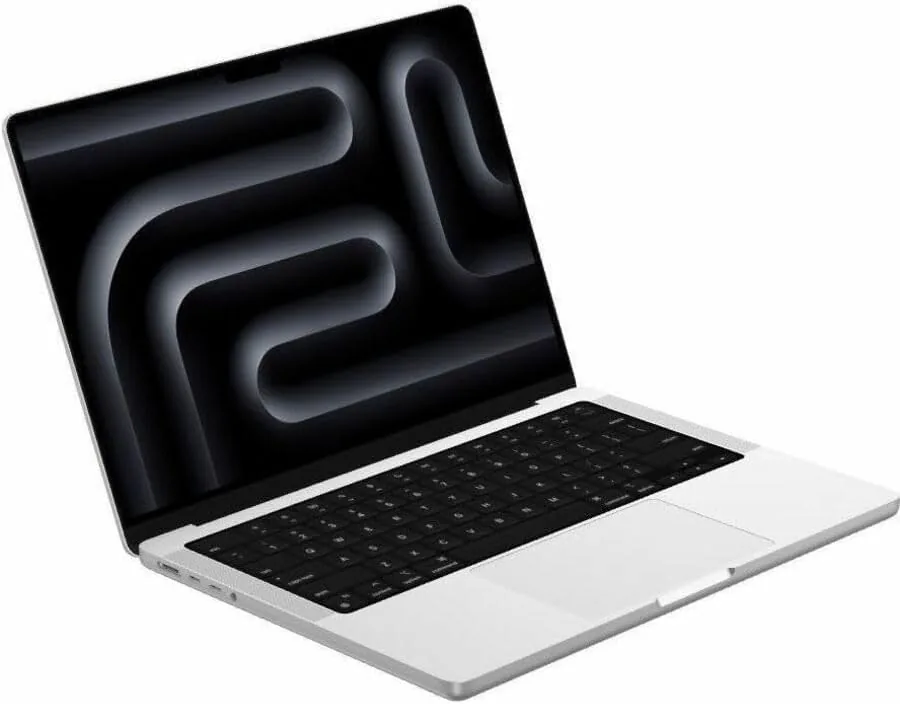 The MacBook Pro on a desk compiling code with a terminal and editor open