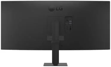 A racing game running on the LG ultrawide monitor showing the wide field of view