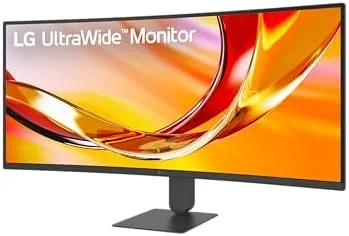A home office setup with the LG ultrawide monitor and a single laptop cable on the desk