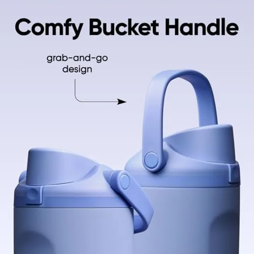 The Owala bottle inside a work bag next to a laptop and notebook