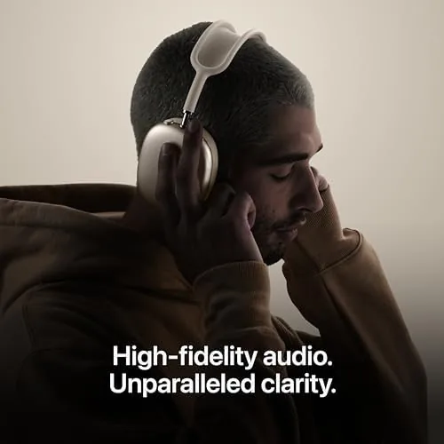 AirPods Max 2 in Purple next to a media remote and streaming device