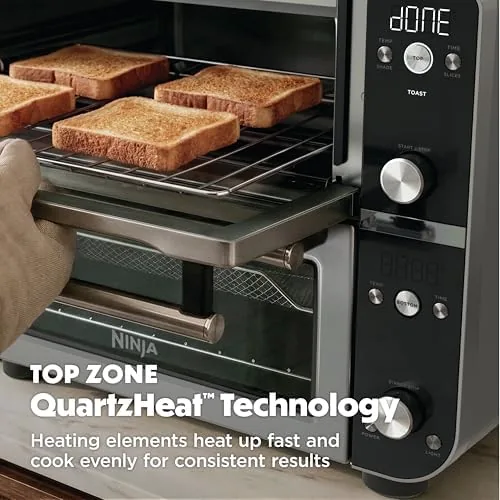 Ninja Double Oven Pro with crumb tray pulled out for cleaning