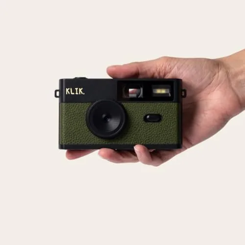 A child using the Klik camera outdoors on a family walk