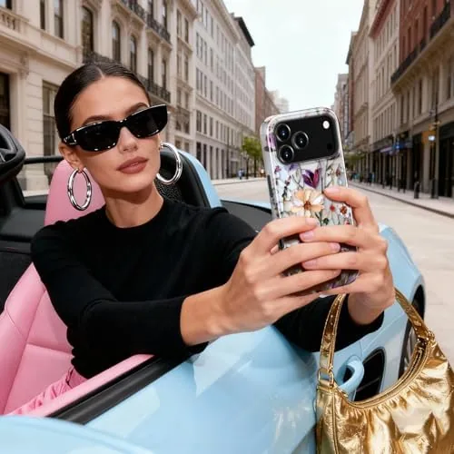 The floral cased iPhone in a hand showing the slim profile and grip