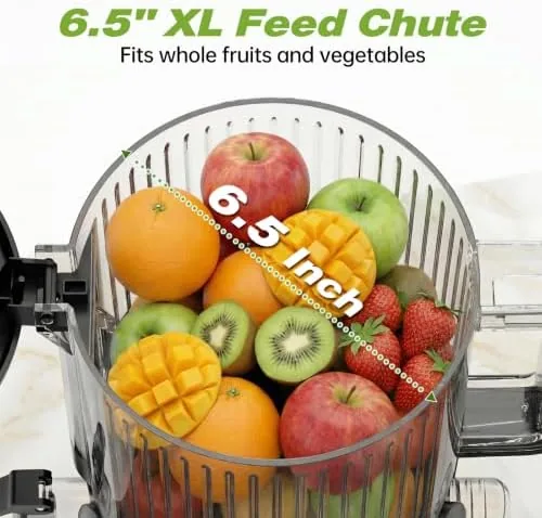 Juice flowing from the spout as produce feeds through the auger