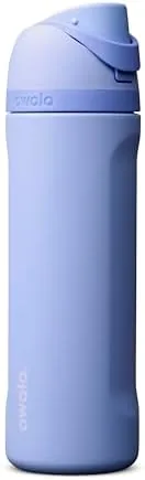 The Owala FreeSip 24 oz bottle in the Out of the Blue finish standing on a table