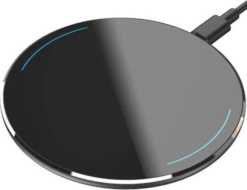 The TOZO W1 Max wireless charging pad on a wooden nightstand with a phone charging