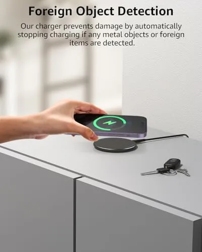 The TOZO W1 Max on a desk beside a laptop and a notebook