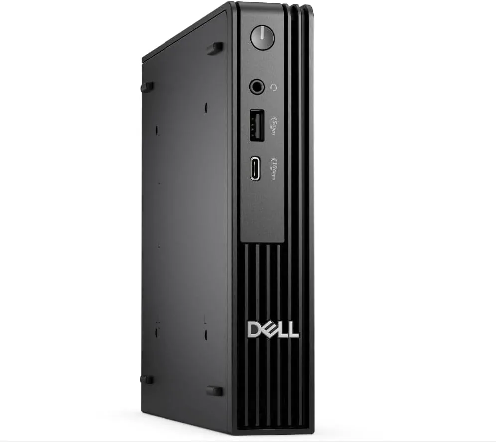 The Dell Pro Micro desktop mounted behind a monitor with dual displays