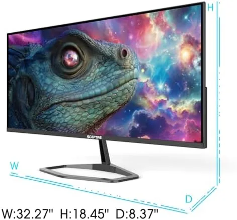The monitor on a desk with a keyboard and mouse, ready for a gaming session