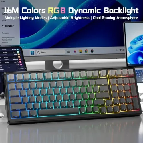 Keyboard typing in a dim room showing RGB backlit side legends