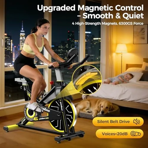 Person adjusting the saddle height on the stationary bike for a comfortable fit