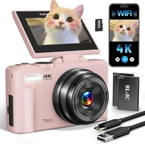 The compact 4K digital camera held in a teenager's hand with the flip screen open
