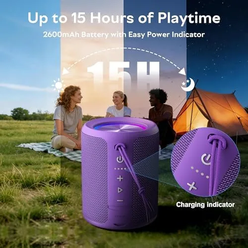 The speaker on a picnic table with the RGB light ring glowing