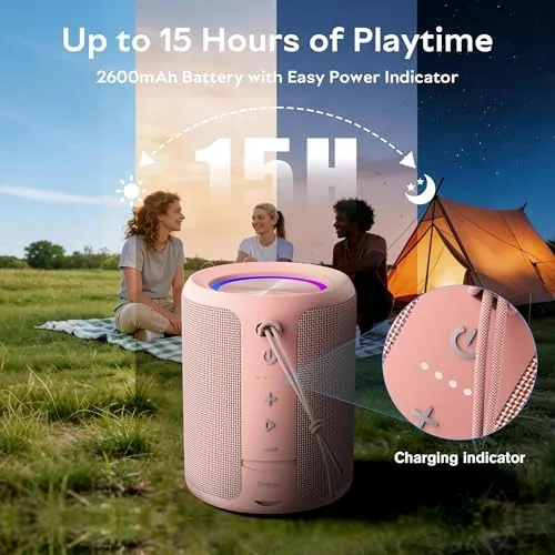 The pink speaker with its RGB light ring pulsing to the music