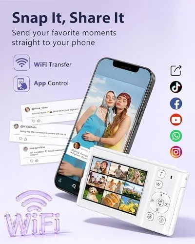 The camera on a table beside its two batteries, charging cable, and 32GB card