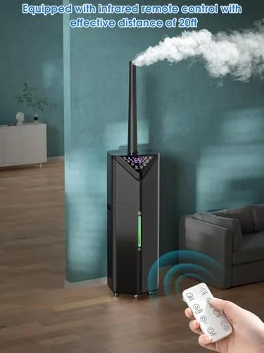 The humidifier misting toward a row of house plants near a bright window