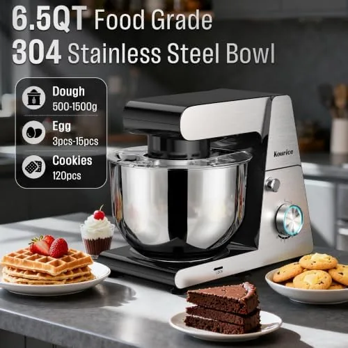 The wire whisk attachment whipping cream to stiff peaks in the stainless steel bowl