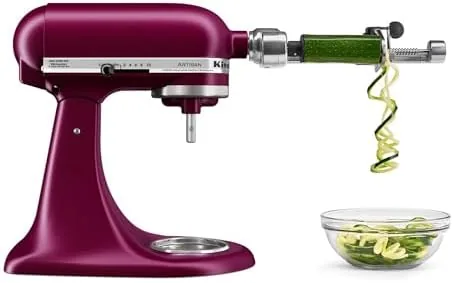 A finished meringue and cookies on the counter beside the Beetroot mixer