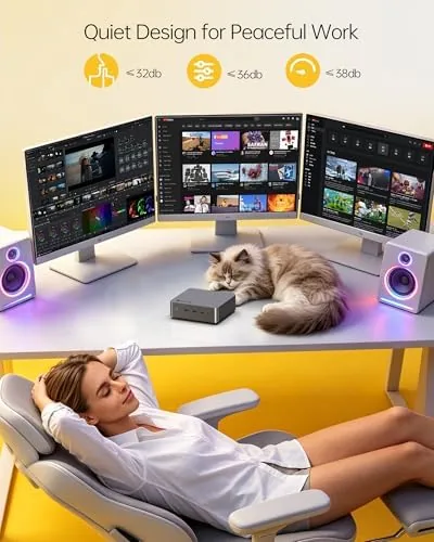 The mini PC next to a desktop tower showing the size difference
