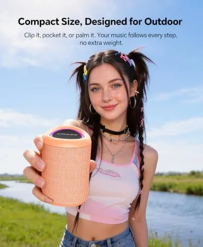 The speaker charging on a patio table after a long session