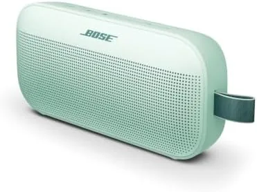 Bose SoundLink Flex speaker in Dewdrop Mint on a patio table