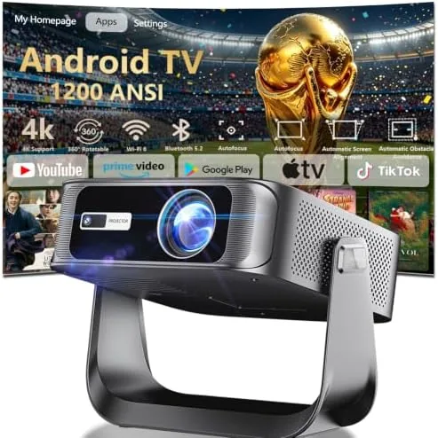 The mini smart projector on a table with a bright image on the wall