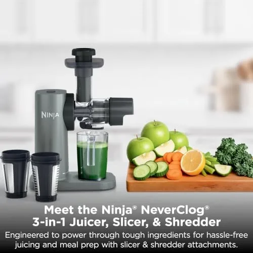 Close up of the wide feed chute and the pusher for the juicer